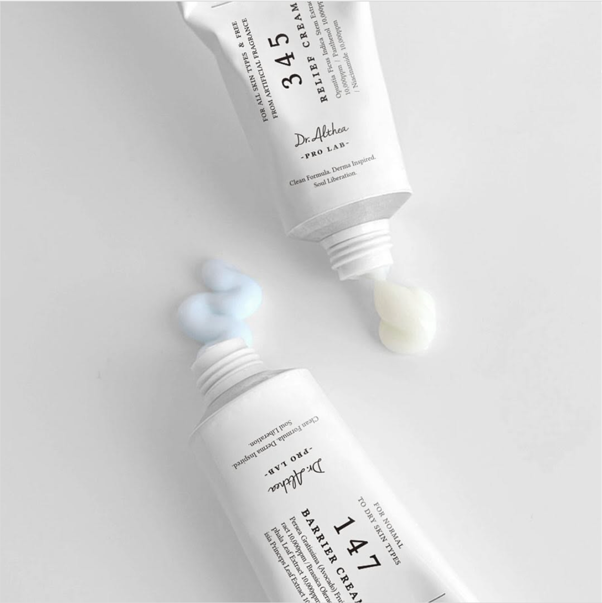 Dr. Althea skincare featuring vitamin C serums and calming cleansers in elegant pastel-toned packaging
